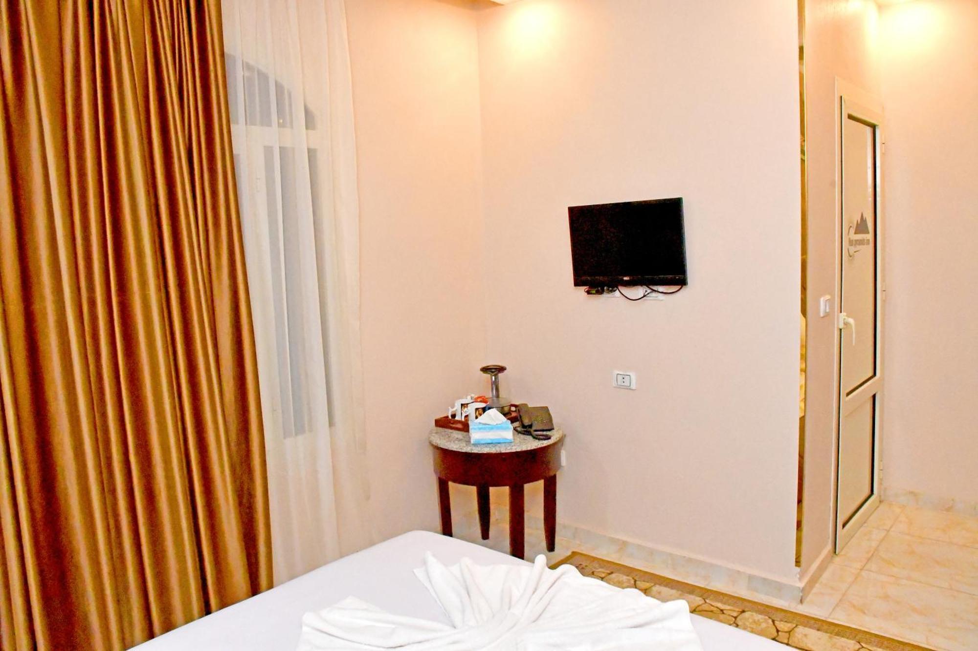 Nun Pyramids Hotel Kafret el-Gabal Habitación foto